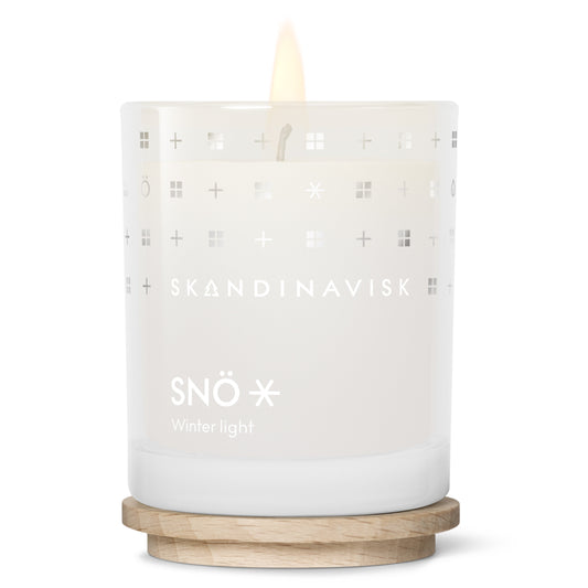 Skandinavisk SNÖ 65g Scented Candle scented candle — available at Tegrino Studio with Bang & Olufsen speaker covers