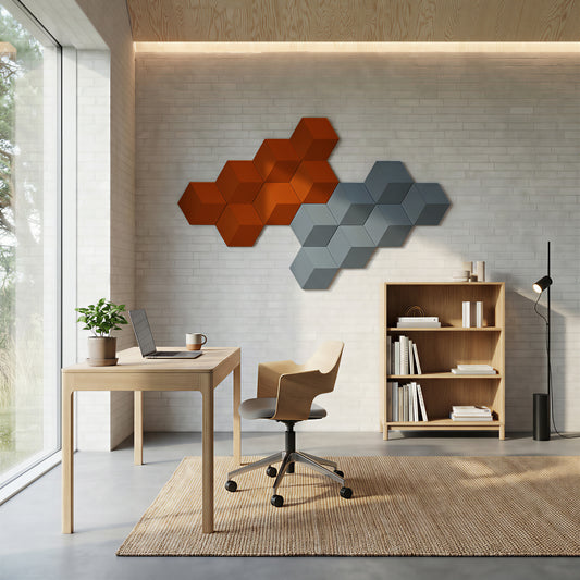 Bang & Olufsen BeoSound Shape speaker with Slate Grey cover by Tegrino Studio in a contemporary living space, presenting cool, balanced grey with just enough depth to catch the light on each side of the hexagon. The kind of neutral that holds a wall together