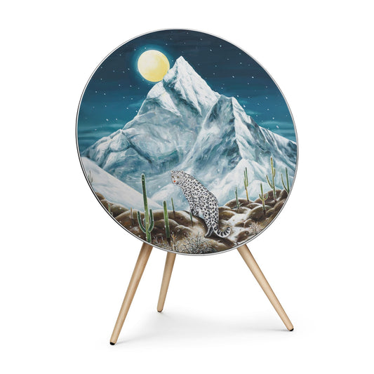 Bang & Olufsen Beoplay A9 speaker cover Toward the Moonlight by Aira Choi, a snow leopard beneath K2 and a full moon, printed on acoustically transparent fabric