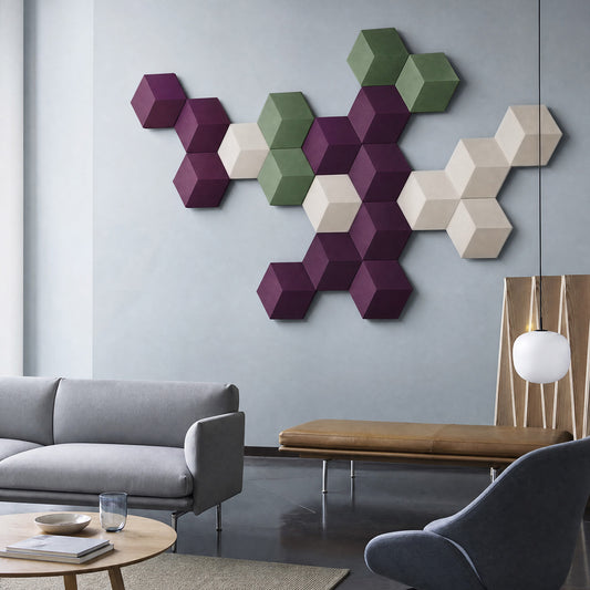 Bang & Olufsen Beosound Shape with Damson covers by Tegrino Studio, mixed with olive green and off-white tiles on a grey wall above a sofa