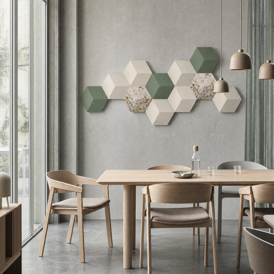 Bang & Olufsen Beosound Shape with Herbarium covers by Tegrino Studio, a hexagon wall above an oak dining table