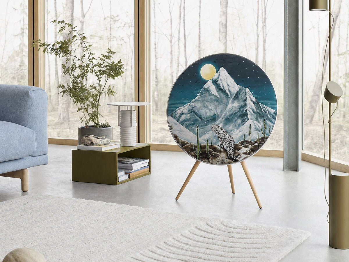 Toward the Moonlight by Aira Choi — a snow leopard under K2 and a full moon, as a cover for the Bang & Olufsen Beoplay A9