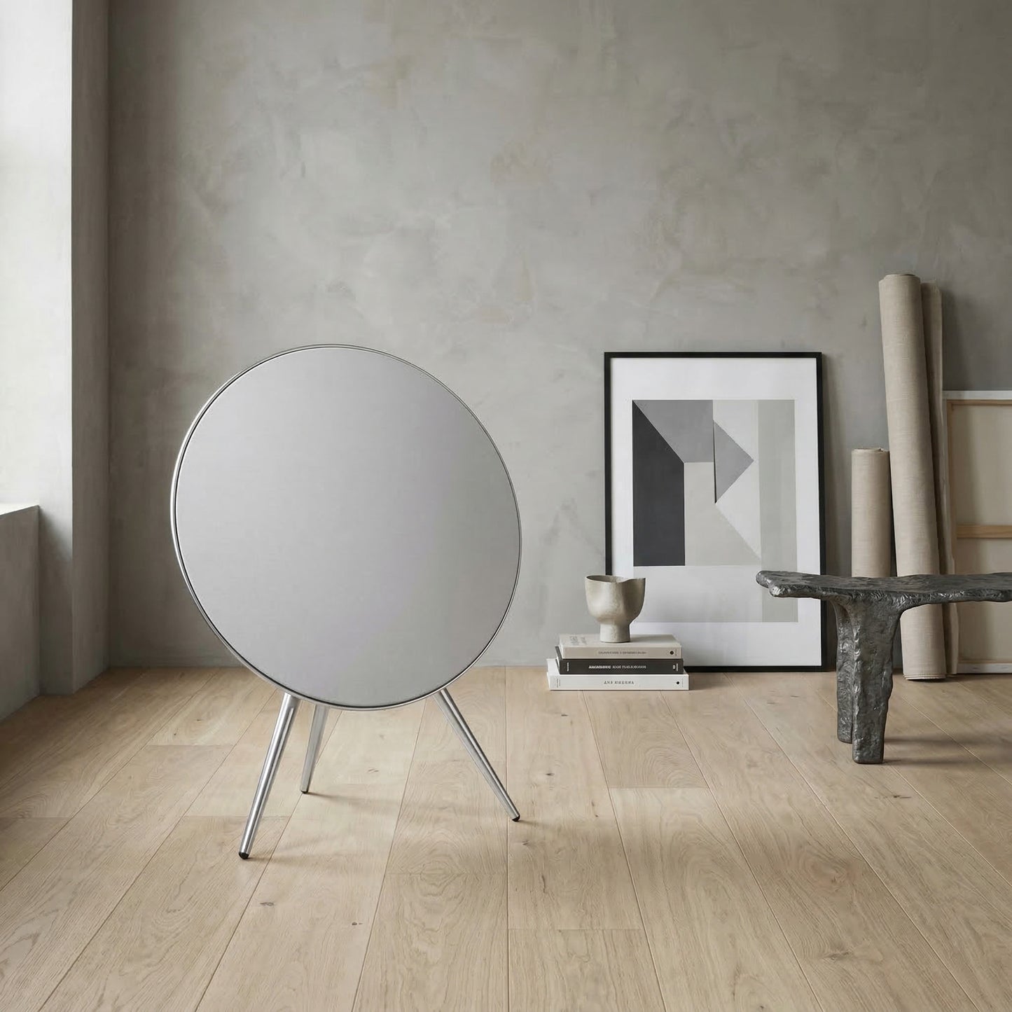 BeoPlay A9 and BeoSound A9 speaker with BeoPlay / BeoSound A9 Aluminum Legs - Chrome cover by Tegrino Studio in a softly lit home setting, emphasizing distinctive artistic design
