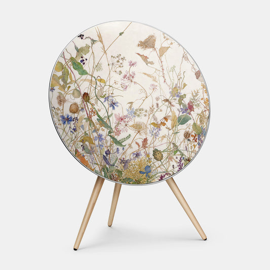 Bang & Olufsen BeoPlay A9 speaker cover Herbarium by Tegrino Studio featuring wild flowers and grasses in watercolour on warm off-white, printed on acoustically transparent fabric