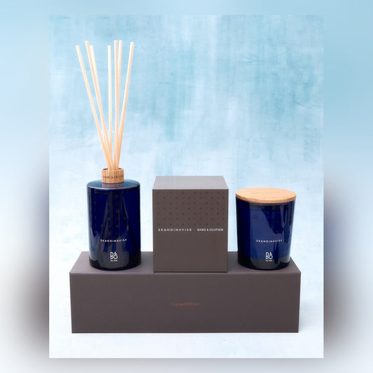 Bang & Olufsen x Skandinavisk centenary set — scented candle with embossed oak lid and reed diffuser with presentation boxes