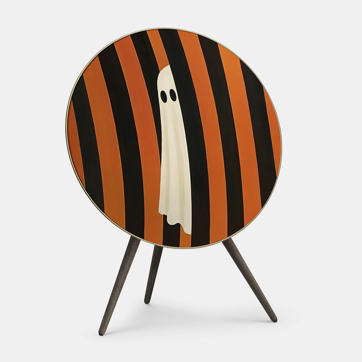 Bang & Olufsen Beoplay A9 speaker cover Spectre by Tegrino Studio, a small white ghost between hand-painted orange and black stripes, printed on acoustically transparent fabric