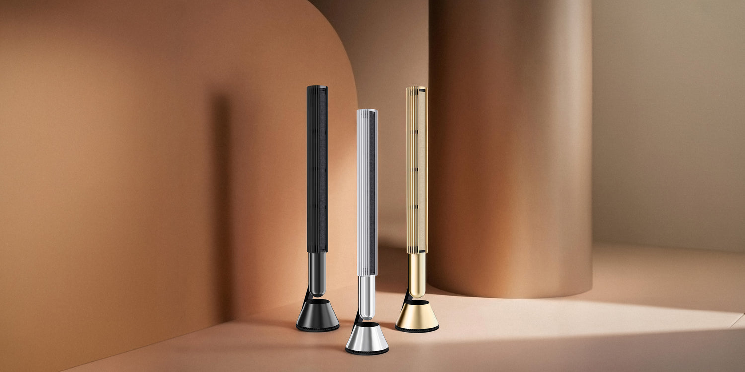 Bang & Olufsen BeoLab 28 aluminium cover collection by Tegrino Studio featuring Black, Silver and Gold Tone satin-anodised finishes displayed side by side against a warm terracotta studio backdrop