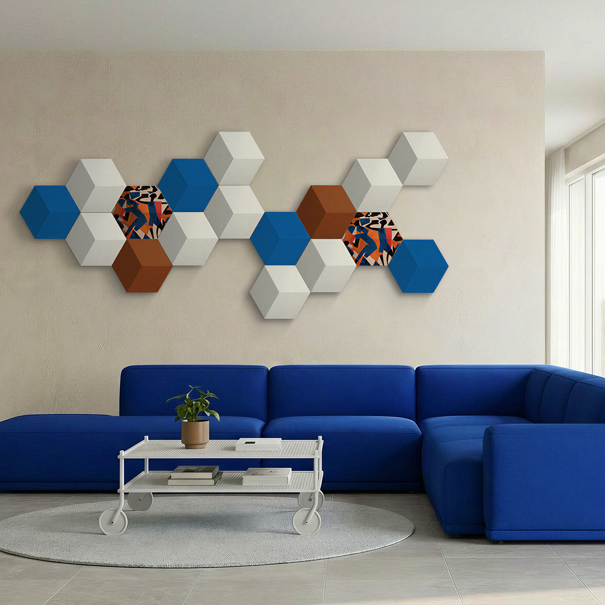 Bang & Olufsen BeoSound Shape speaker cover Verve by Tegrino Studio in a minimalist home environment, highlighting bold figurative silhouettes in vivid blue and orange mixed with solid blue, warm grey and terracotta hexagonal tiles on cream wall above cobalt blue modular sofa