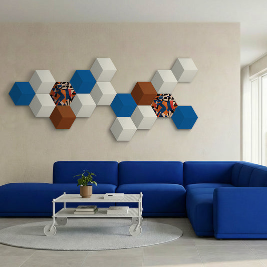 Bang & Olufsen BeoSound Shape speaker cover Verve by Tegrino Studio in a minimalist home environment, highlighting bold figurative silhouettes in vivid blue and orange mixed with solid blue, warm grey and terracotta hexagonal tiles on cream wall above cobalt blue modular sofa