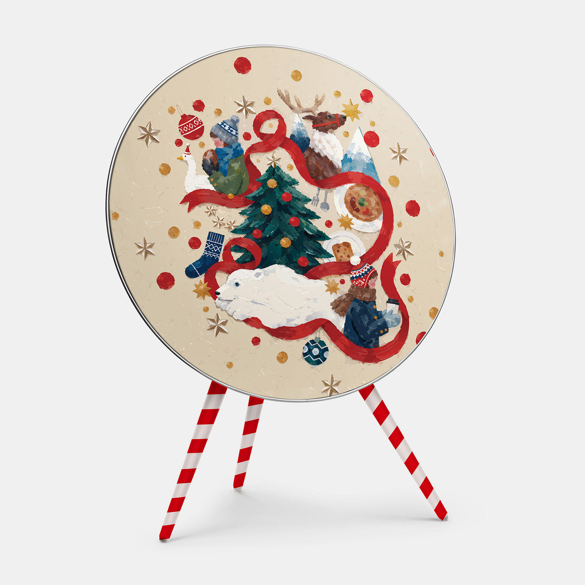 Bang & Olufsen Beoplay A9 speaker cover Christmas Tale by Tegrino Studio, a gouache winter story with a red ribbon, a decorated tree, a reindeer and a polar bear on warm sand, printed on acoustically transparent fabric, shown with the matching striped legs cover
